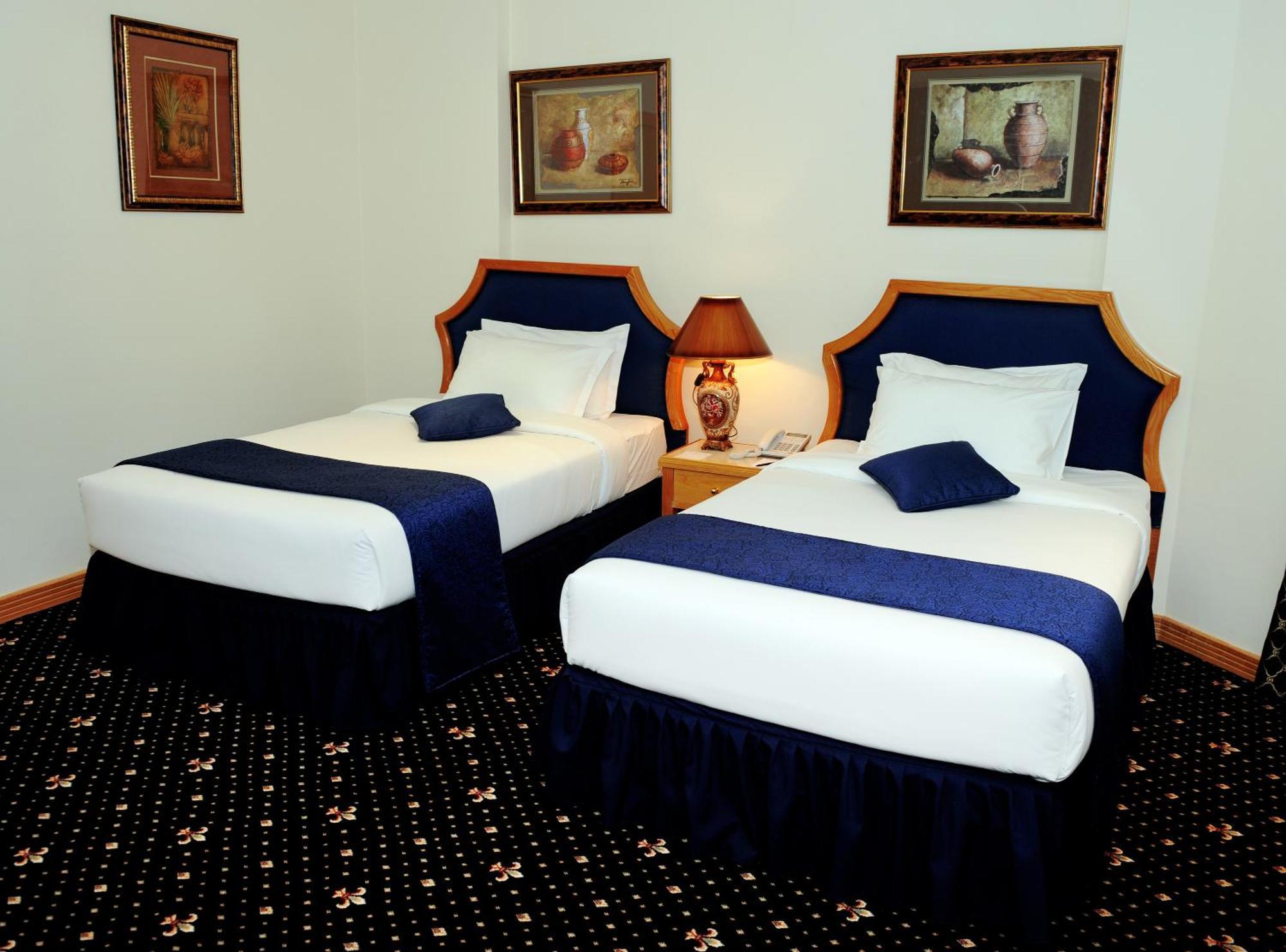 Cayam Hotel Doha Bagian luar foto